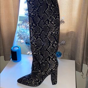 Knee high snake skin boots